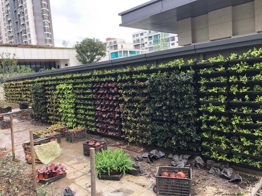 Plantas verdes para exteriores de plástico para jardines verticales y macetas de flores para paredes verdes con estilo